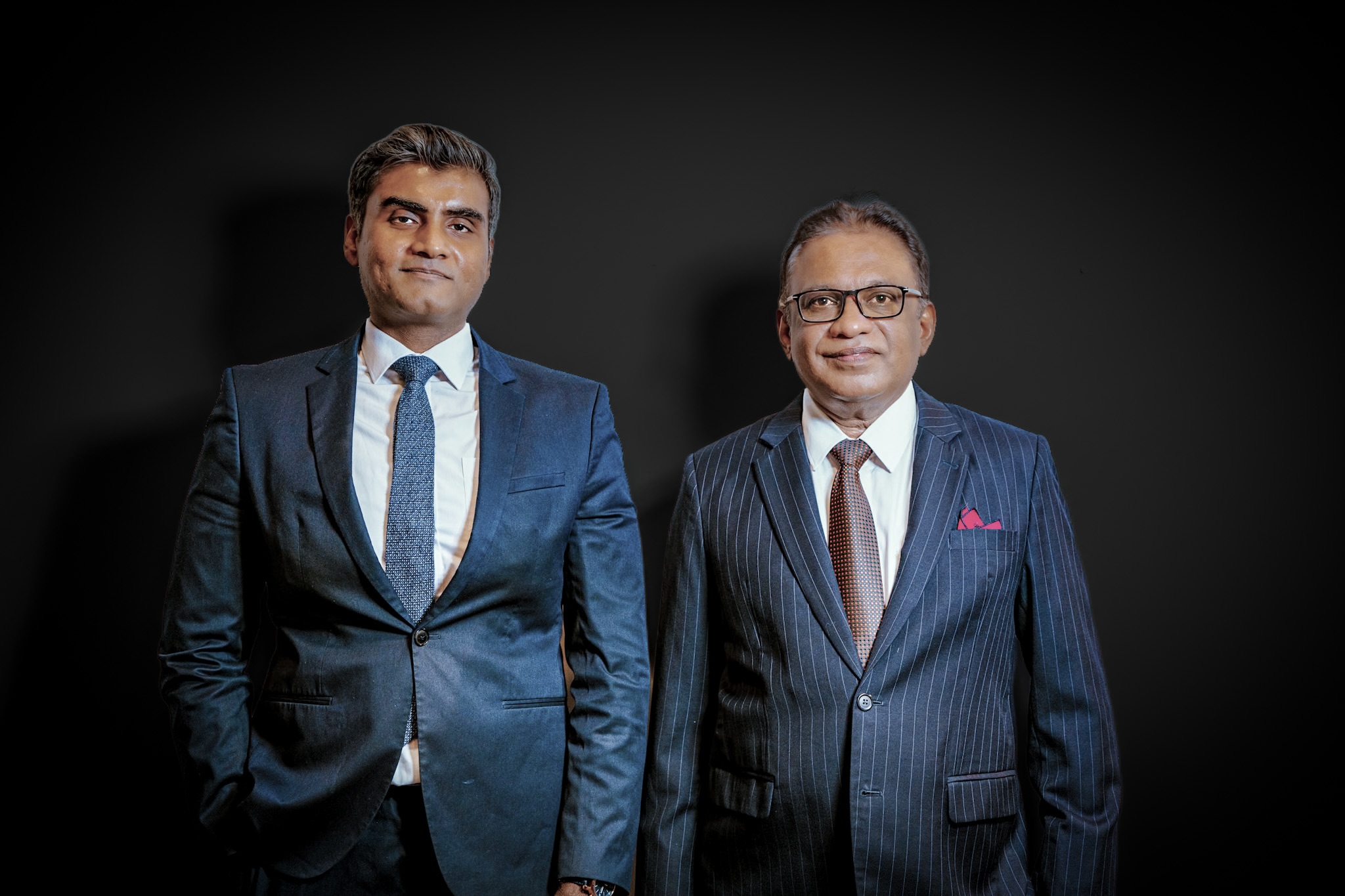 Vinobha Anthony Doss and Dato' George Varughese standing together